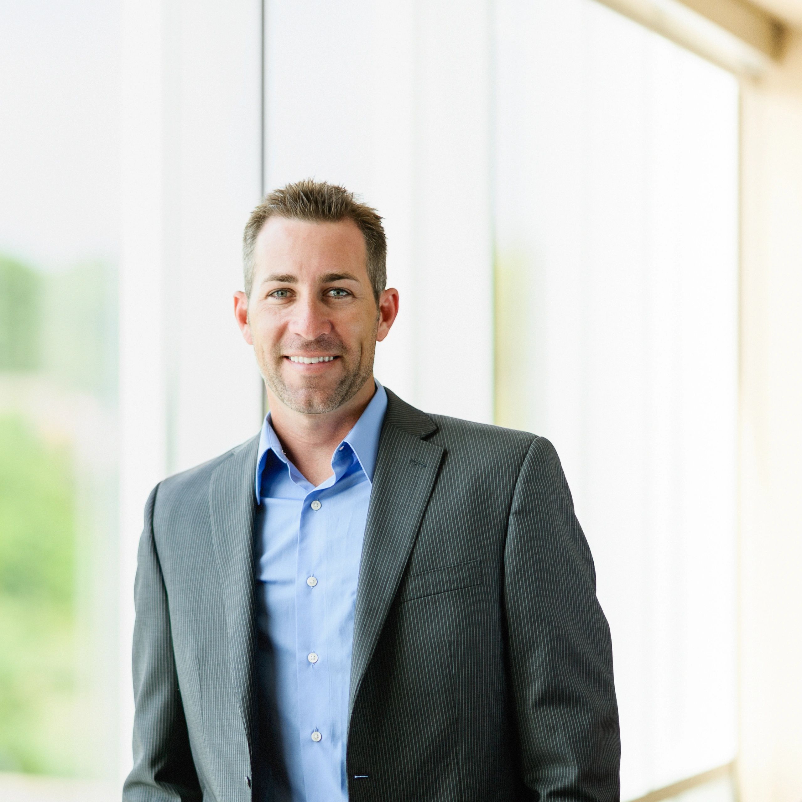 Professional headshot of an executive