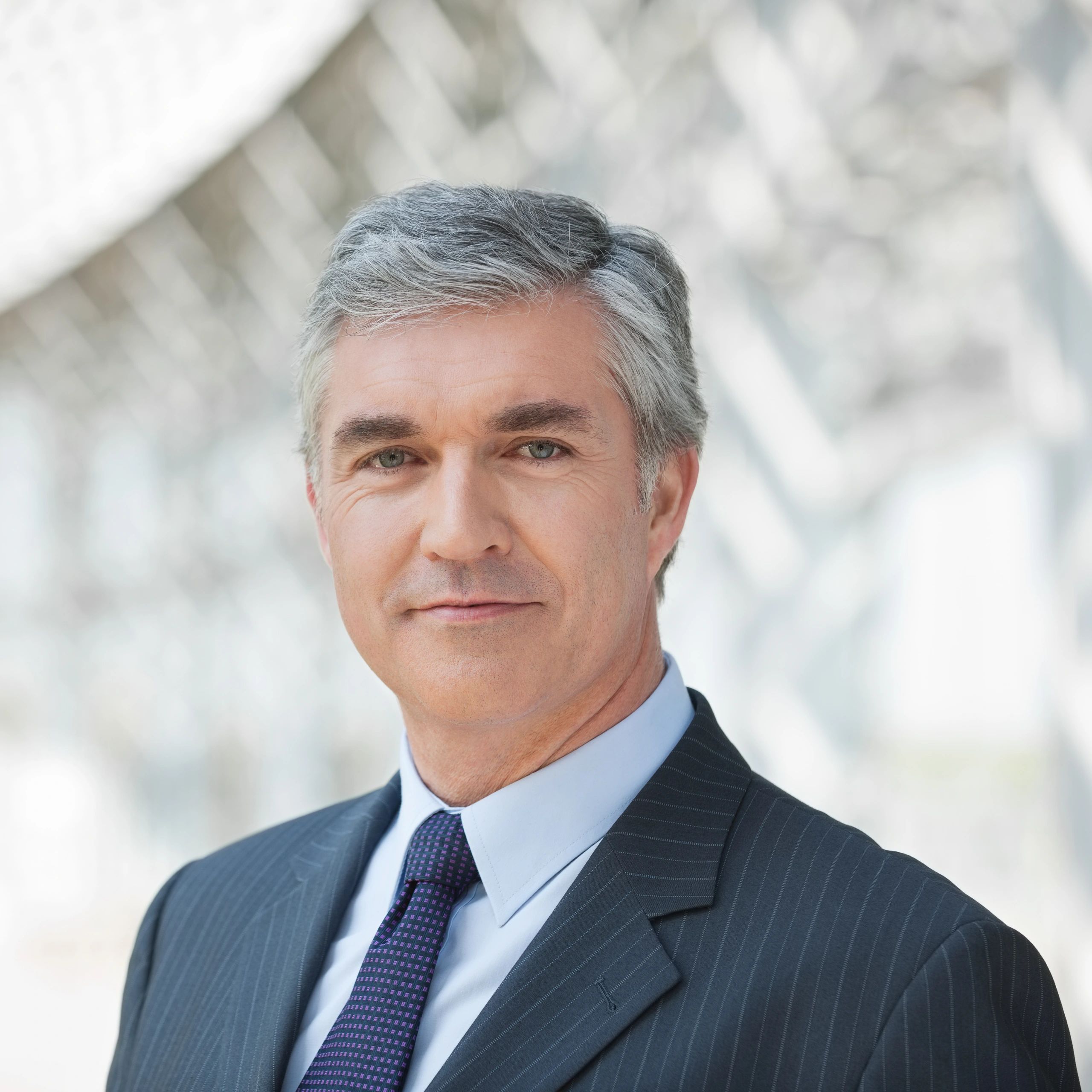 Professional headshot representing leadership team