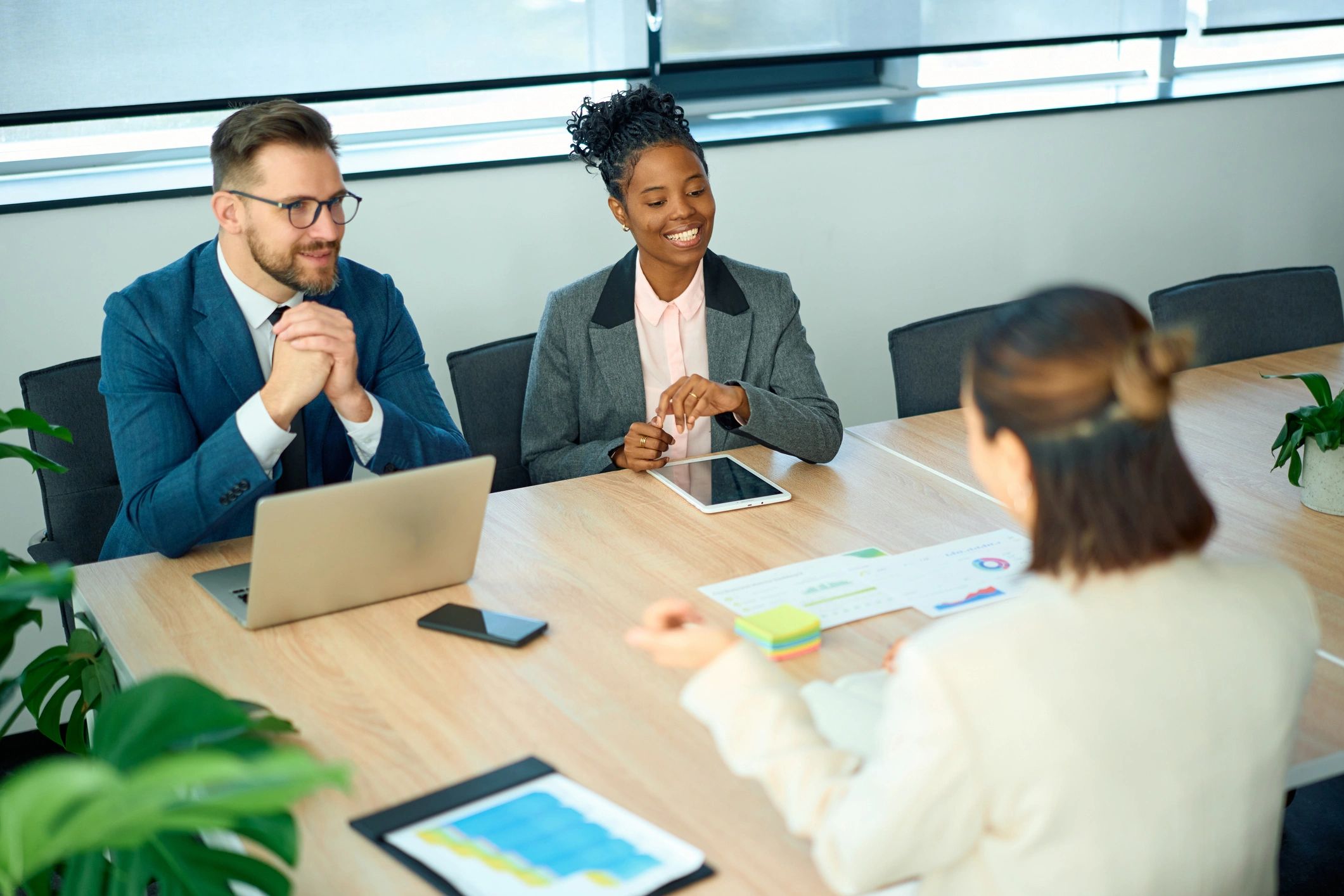 Business professionals collaborating in a meeting room